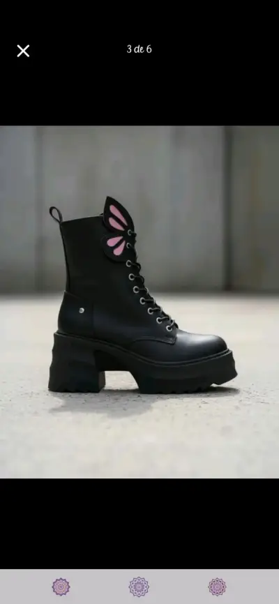 Botas negras con diseño de alas - miniatura 3