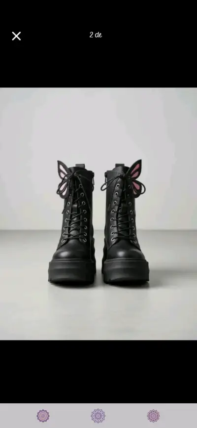 Botas negras con diseño de alas - miniatura 4