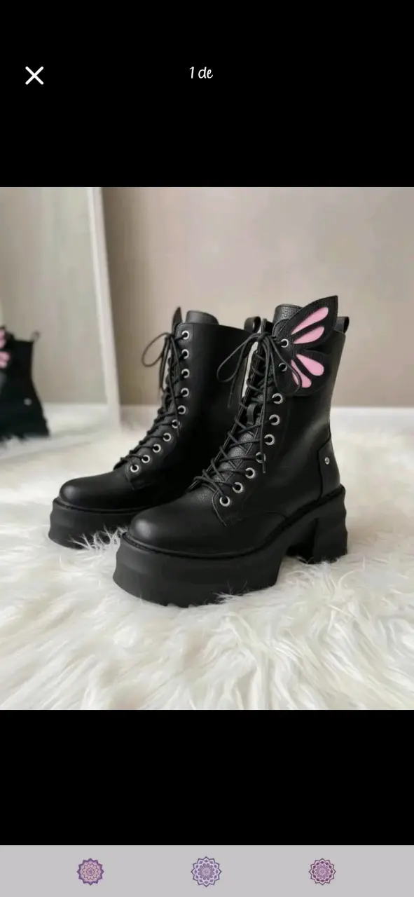 Botas negras con diseño de alas - 5