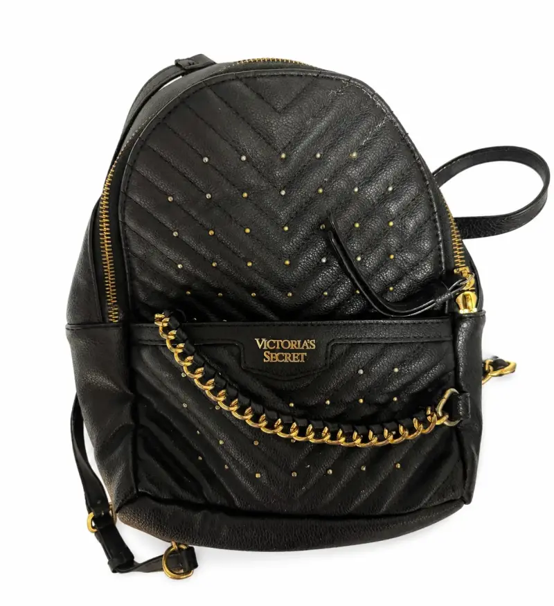 Mochila negra Victoria's Secret con detalles dorados - 1