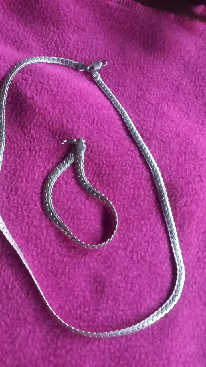 Conjunto de collar y pulsera de plata