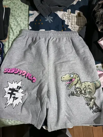 Shorts gris de universal studios Jurassic park - miniatura 1