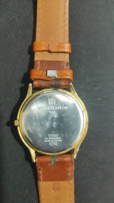 Reloj Michel Herbelin dorado con correa de cuero - miniatura 1