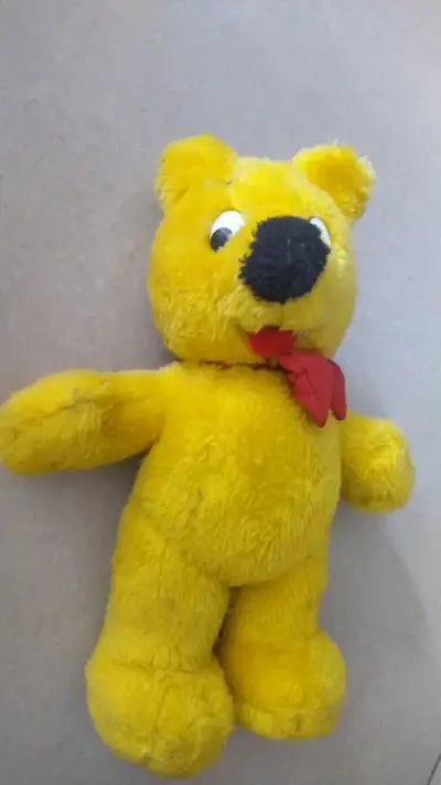 Peluche amarillo con lazo rojo - miniatura 2