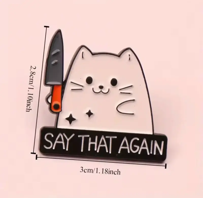 Pin de gato con cuchillo divertido - 2