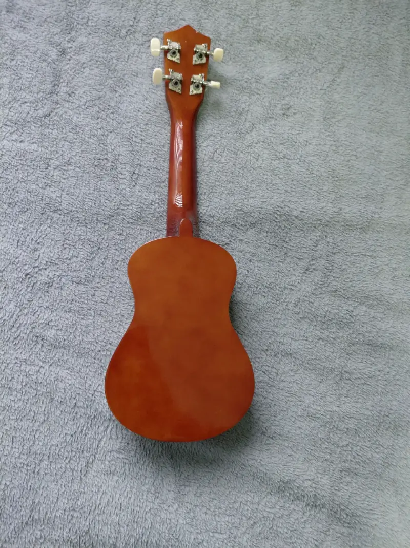 Ukulele acústico de madera color natural - 3