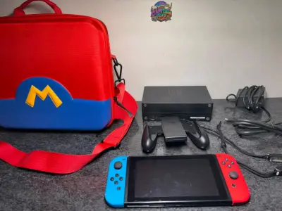 Nintendo Switch con bolso - miniatura 1