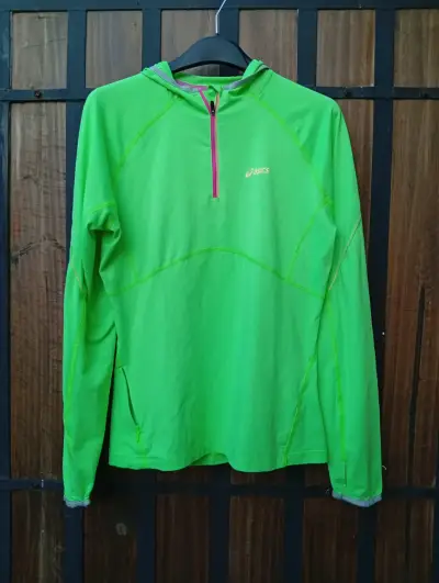 Polerón deportivo Asics verde con capucha - miniatura 1