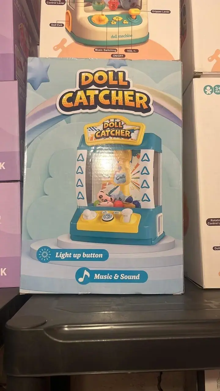 Máquina de juguetes Doll Catcher con luces y sonido