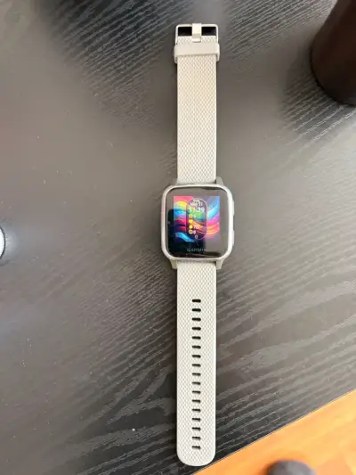 Smartwatch Garmin con correa gris - miniatura 1