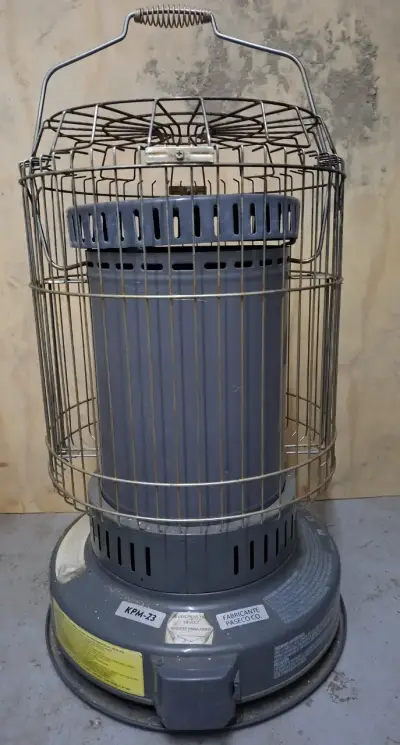 Estufa a queroseno KPM-23 con rejilla protectora - miniatura 1