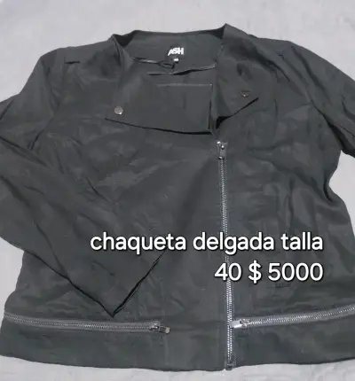 Polera polo negra H&M en buen estado - miniatura 3