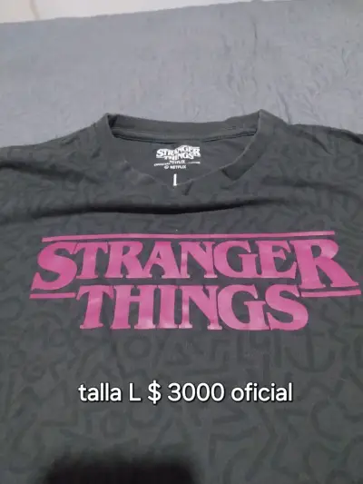 Polera polo negra H&M en buen estado - miniatura 4