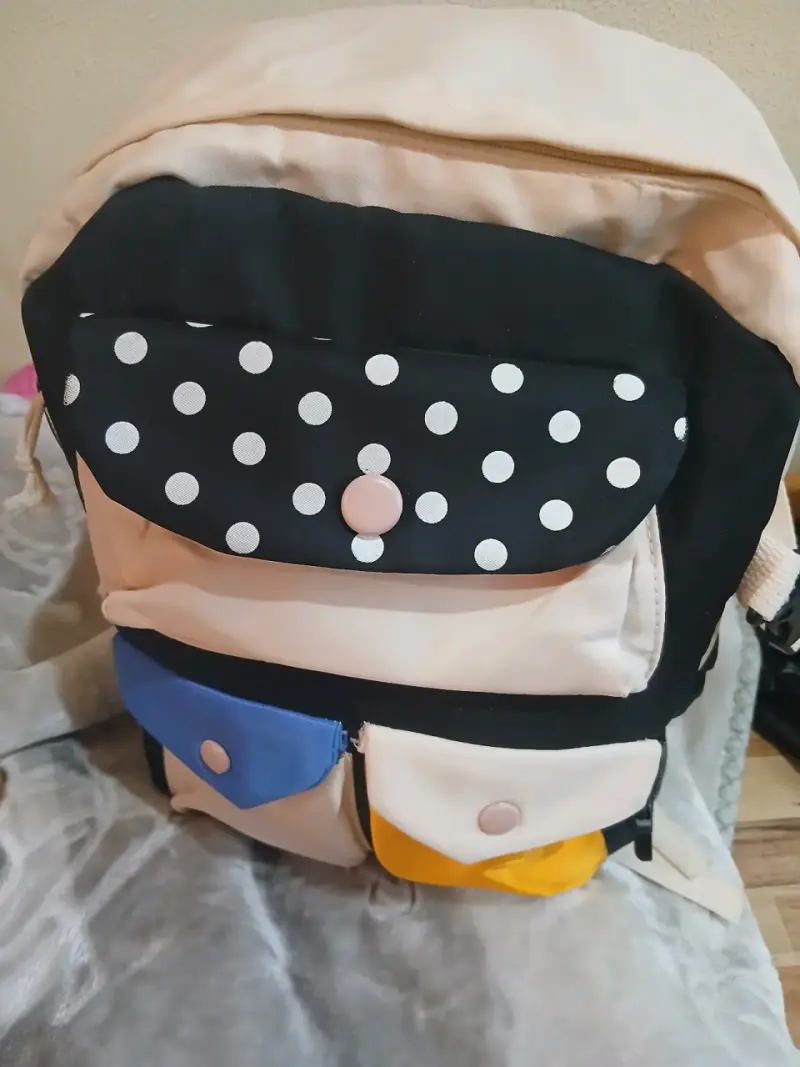 Mochila multicolor con diseño de lunares