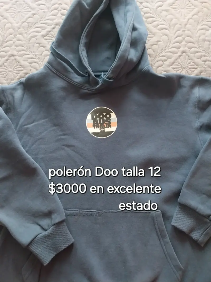 Polerón Doo azul talla 12 en buen estado
