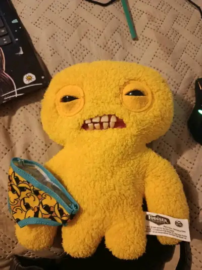 Peluche Fuggler amarillo con dientes - miniatura 1
