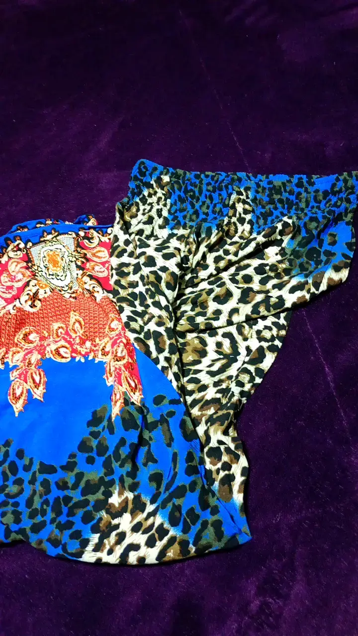 Pantalones estampados animal print y floral - 3