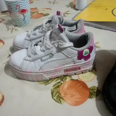 Zapatillas Puma blancas con detalles rosados - miniatura 1
