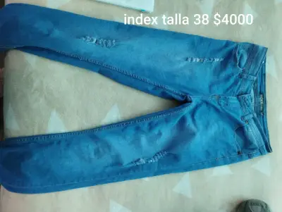 Jeans celestes talla 36 en buen estado - miniatura 2