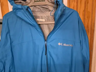 Chaqueta impermeable Columbia azul con capucha - miniatura 2