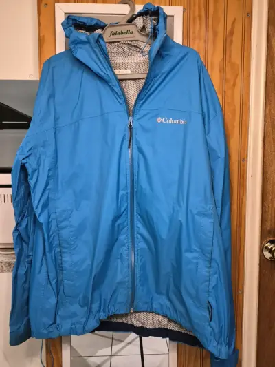 Chaqueta impermeable Columbia azul con capucha - miniatura 3