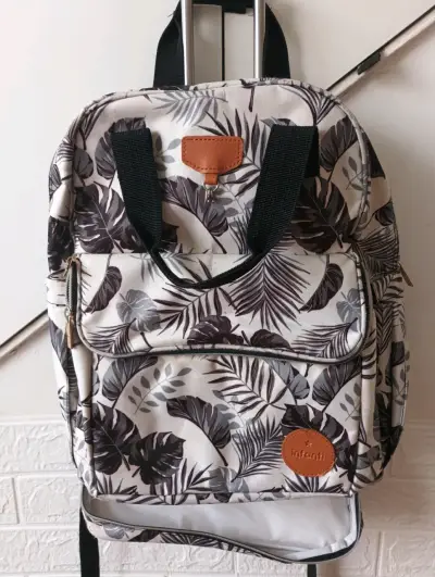 Mochila de pañales Infanti con diseño tropical - miniatura 1
