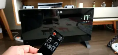 Calefactor eléctrico con control remoto - miniatura 1