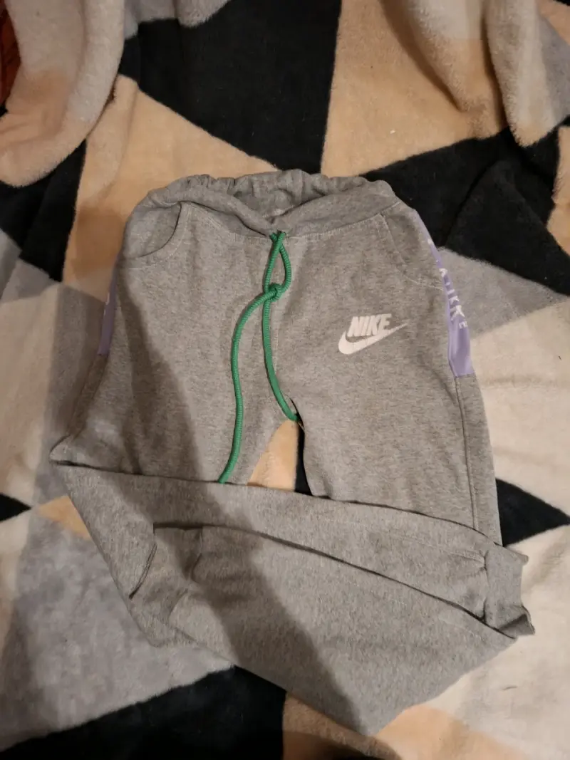 Pantalones deportivos Nike grises unisex