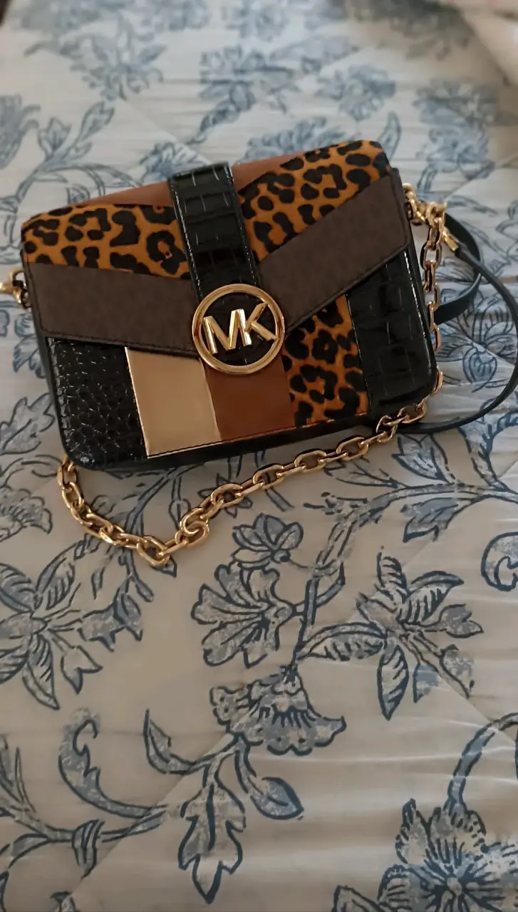 Cartera Michael Kors animal print