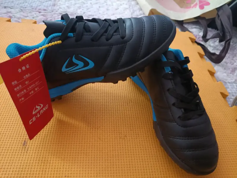 Zapatillas de fútbol CS-Lang negras y azules