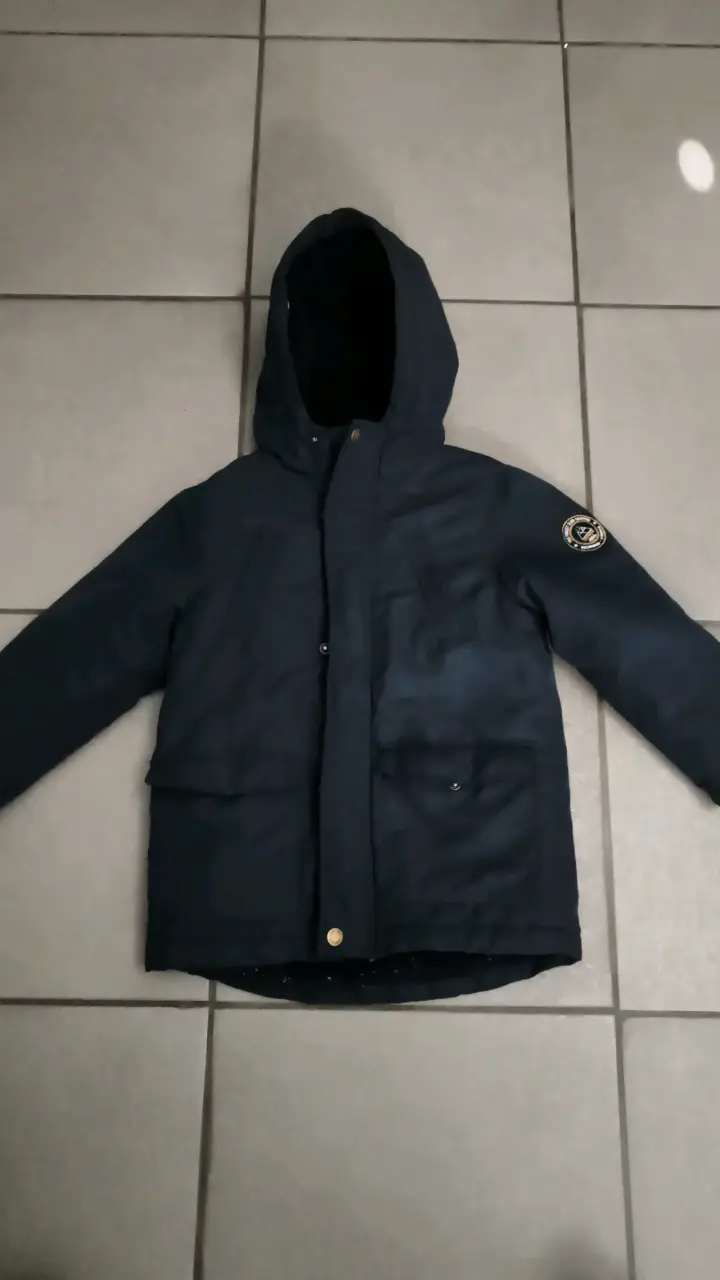 Chaqueta azul con capucha para invierno - 1