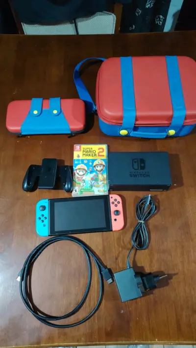 Nintendo Switch con accesorios y juego - miniatura 1