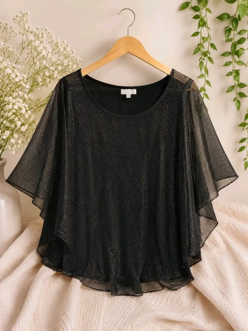 Blusa negra con brillo y mangas sueltas