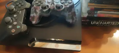 Consola PS3 con juegos y controles - miniatura 3