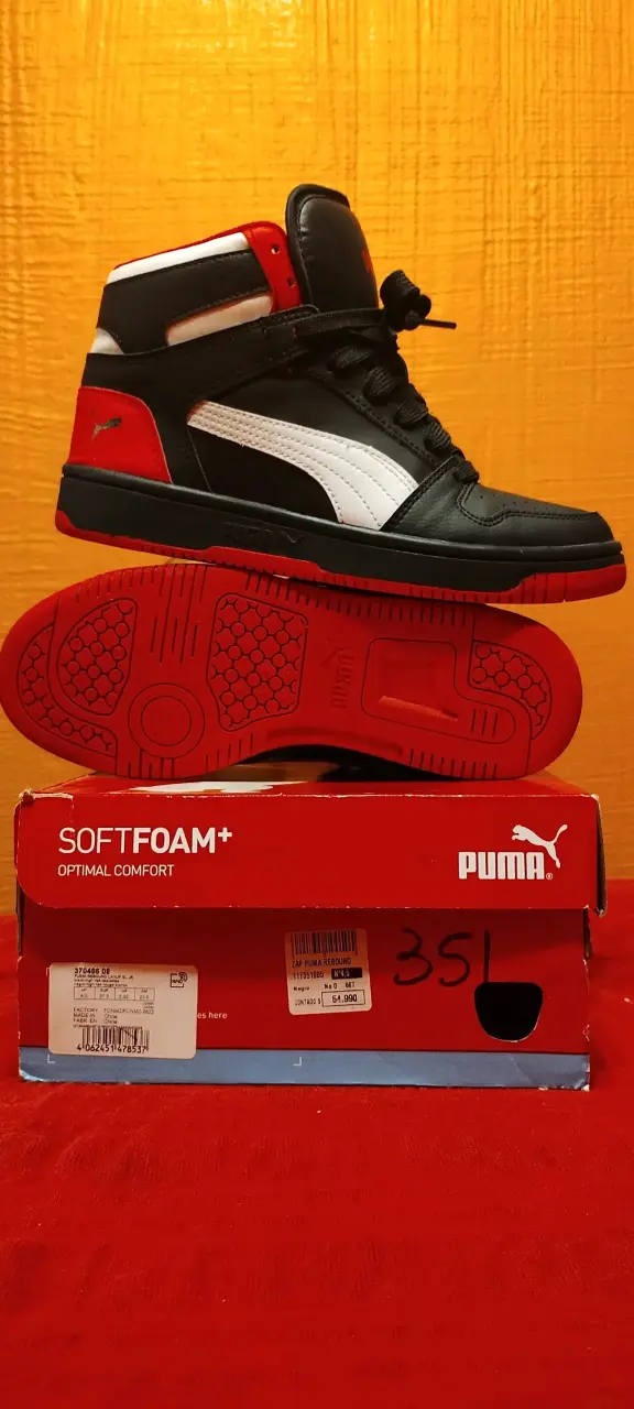 Zapatillas Puma Rebound negras y rojas