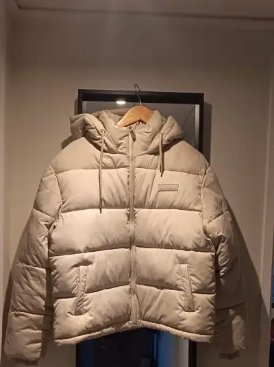 Chaqueta acolchada beige con capucha Ellesse - miniatura 1