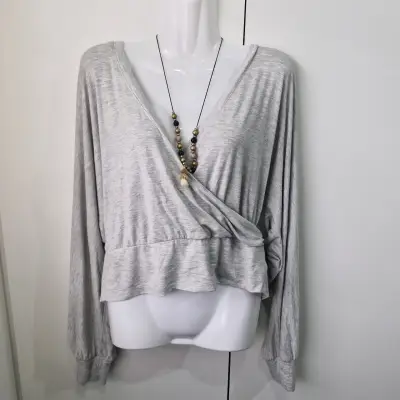Blusa gris de manga larga express talla L - miniatura 1