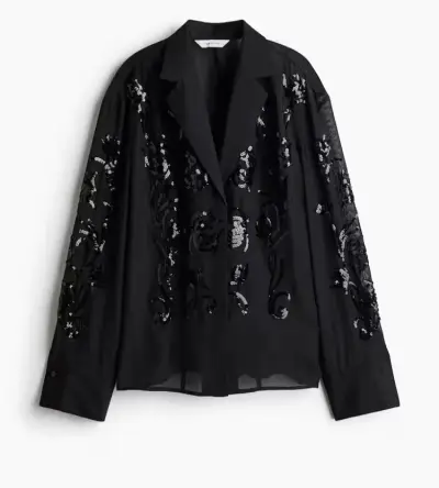 Blusa negra con lentejuelas elegantes - miniatura 1