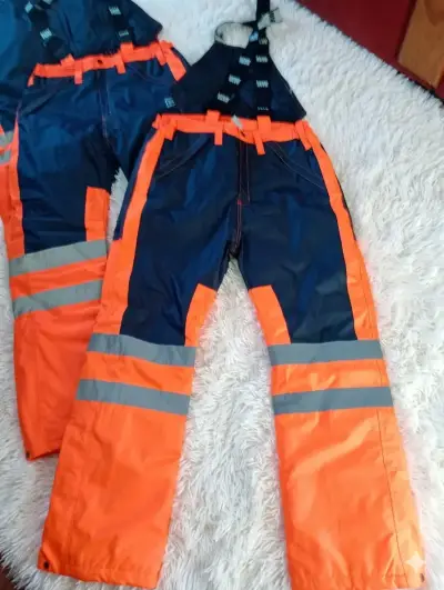Pantalones de trabajo reflectantes naranja y azul - miniatura 1