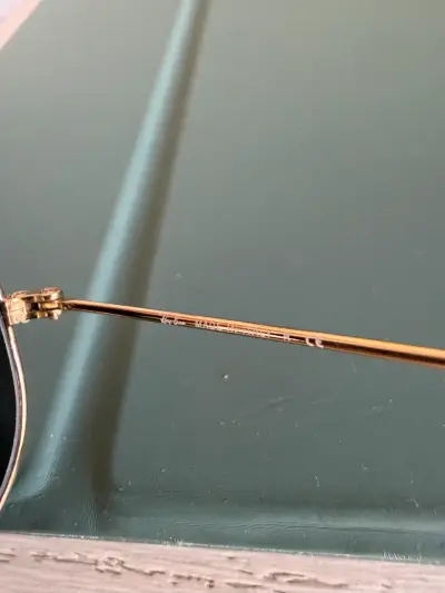 Anteojos de sol Ray-Ban aviador doradas - miniatura 3