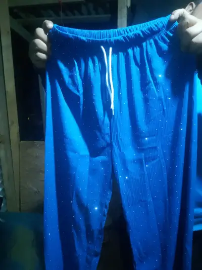 Pantalones azules con brillo para mujer - miniatura 1
