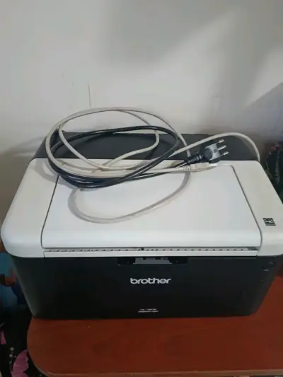 Impresora láser Brother HL-1202 compacta - miniatura 1