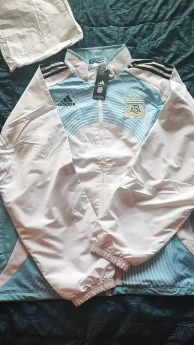 Chaqueta deportiva Adidas AFA blanca con aceleste - miniatura 1