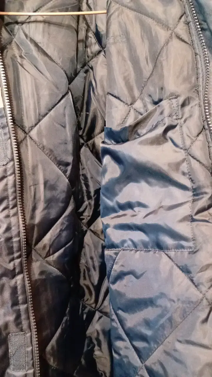 Chaqueta impermeable azul con reflectantes - 2