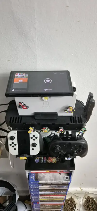 Consola Nintendo Switch con accesorios y juegos - miniatura 1