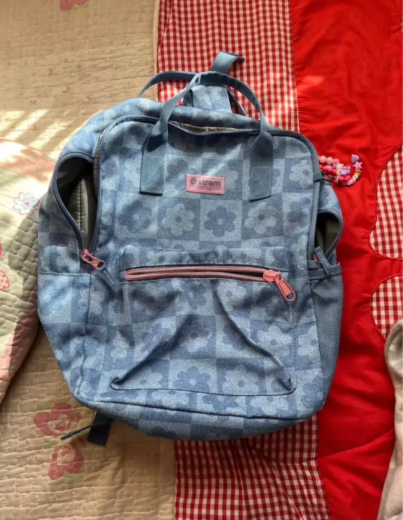 Mochila Xtrem azul con diseño floral - 1