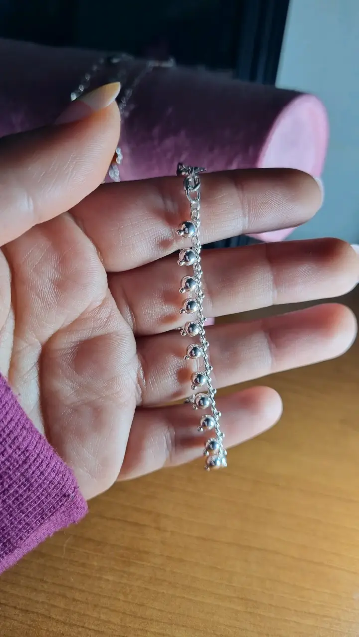Pulseras de plata con dijes variados - 4