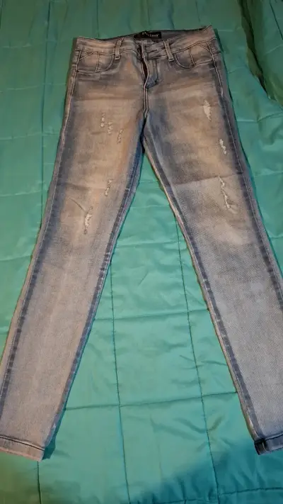 Jeans desgastados azul claro para mujer - miniatura 1