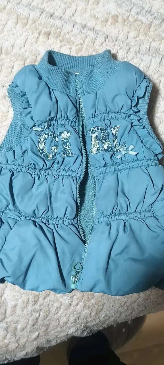 Chaqueta sin mangas azul para niña