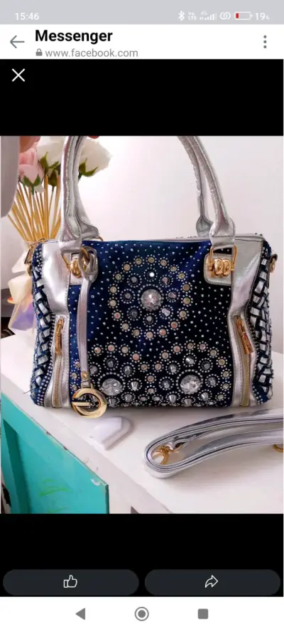 Bolso de mano azul con detalles brillantes - miniatura 1